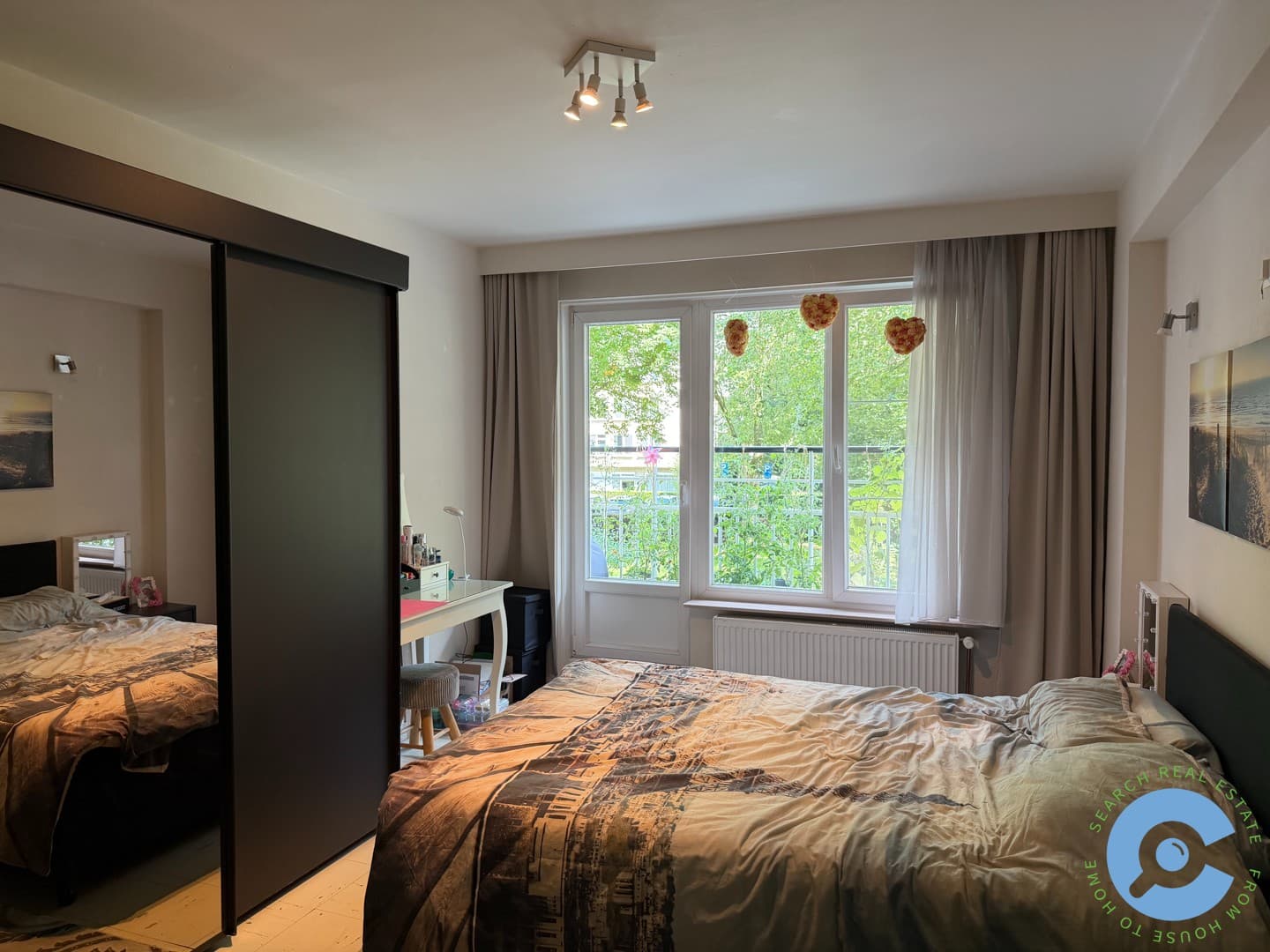 Ruim appartement met 2 slaapkamers en terras! 9