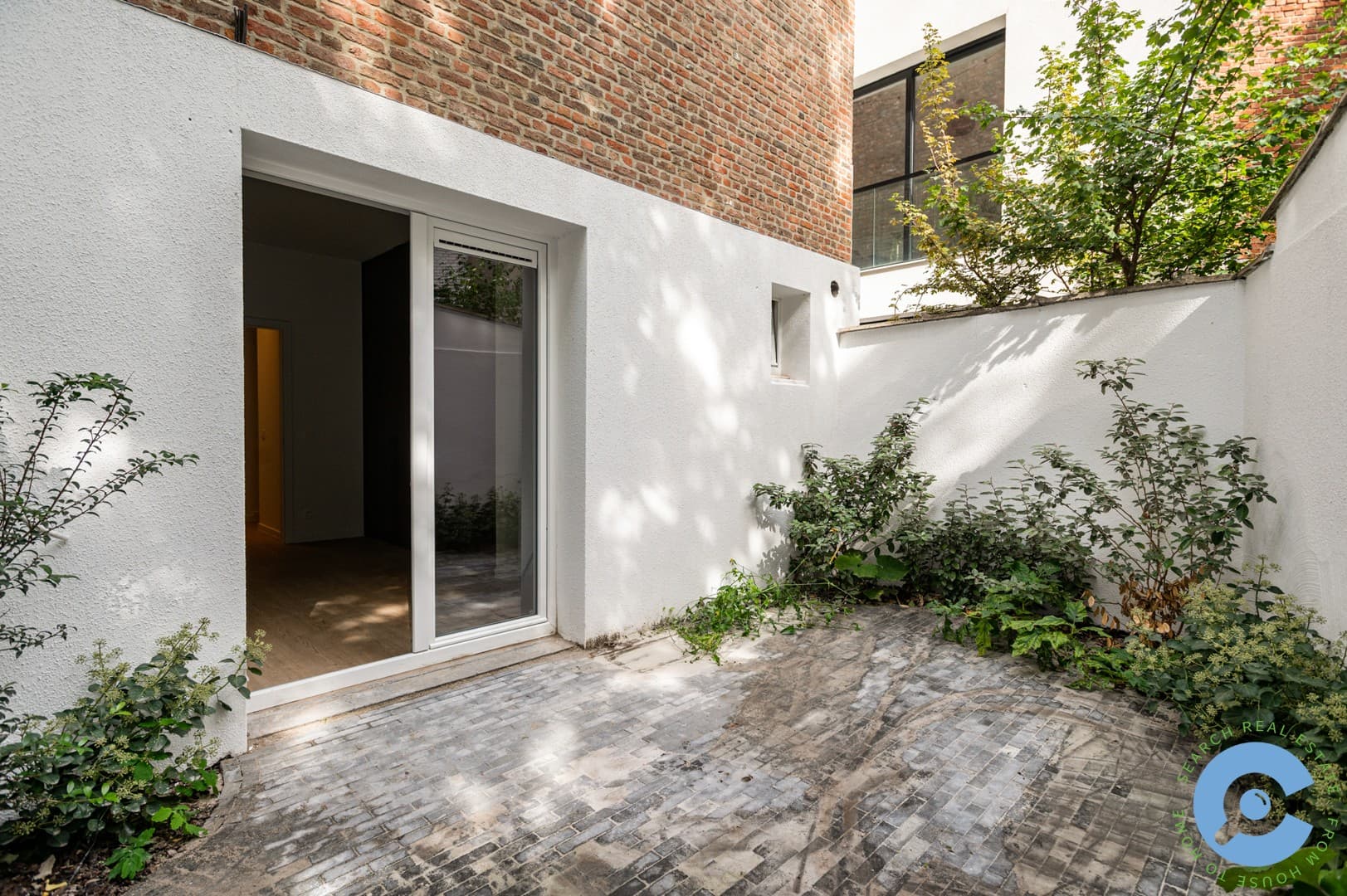 Gerenoveerd gelijkvloers appartement met terras! 10