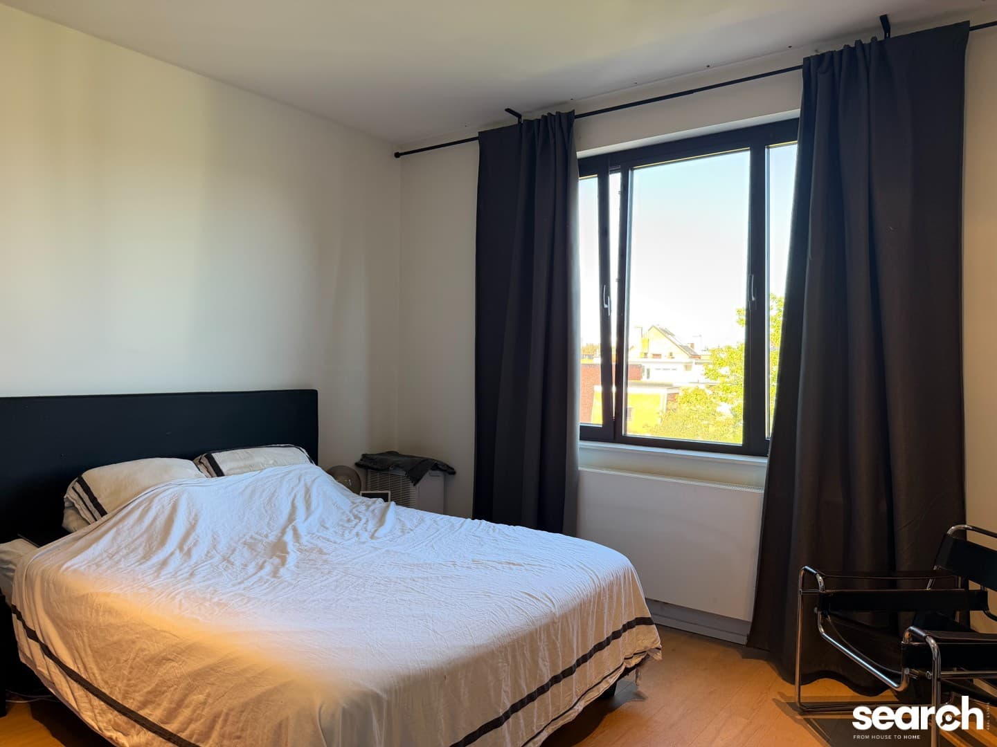 Ruim 1 slaapkamer appartement op TOP-ligging 7