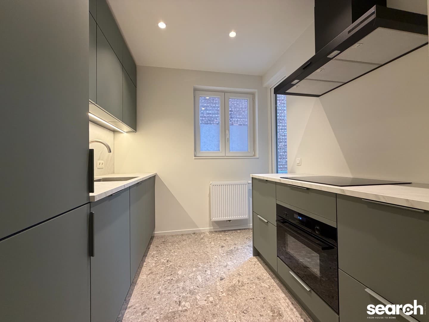 Gerenoveerd 2 slaapkamer appartement met garage! 8